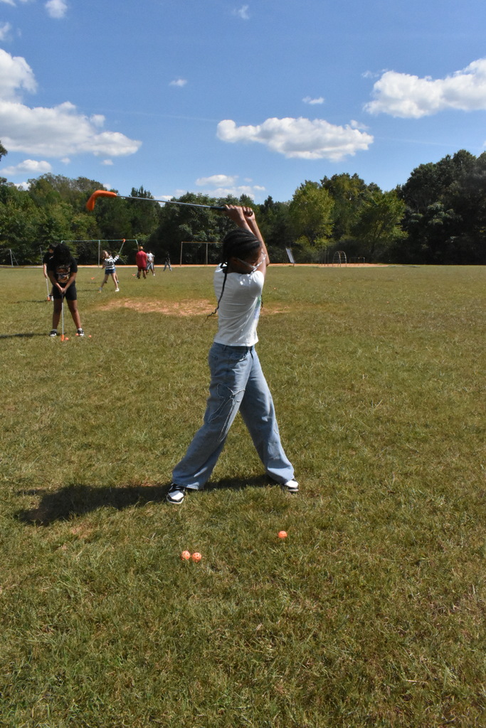 scholars playing golf