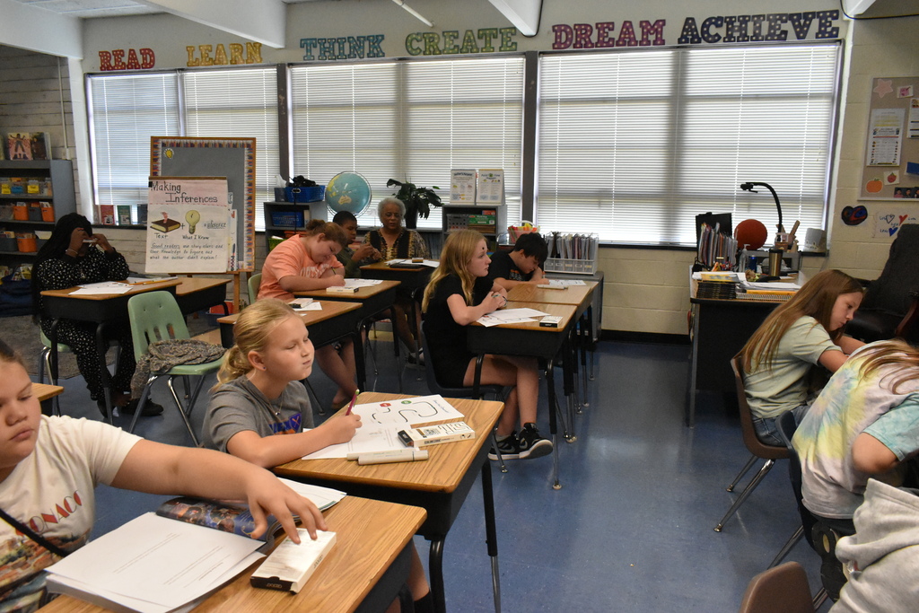 scholars doing division with ozobots