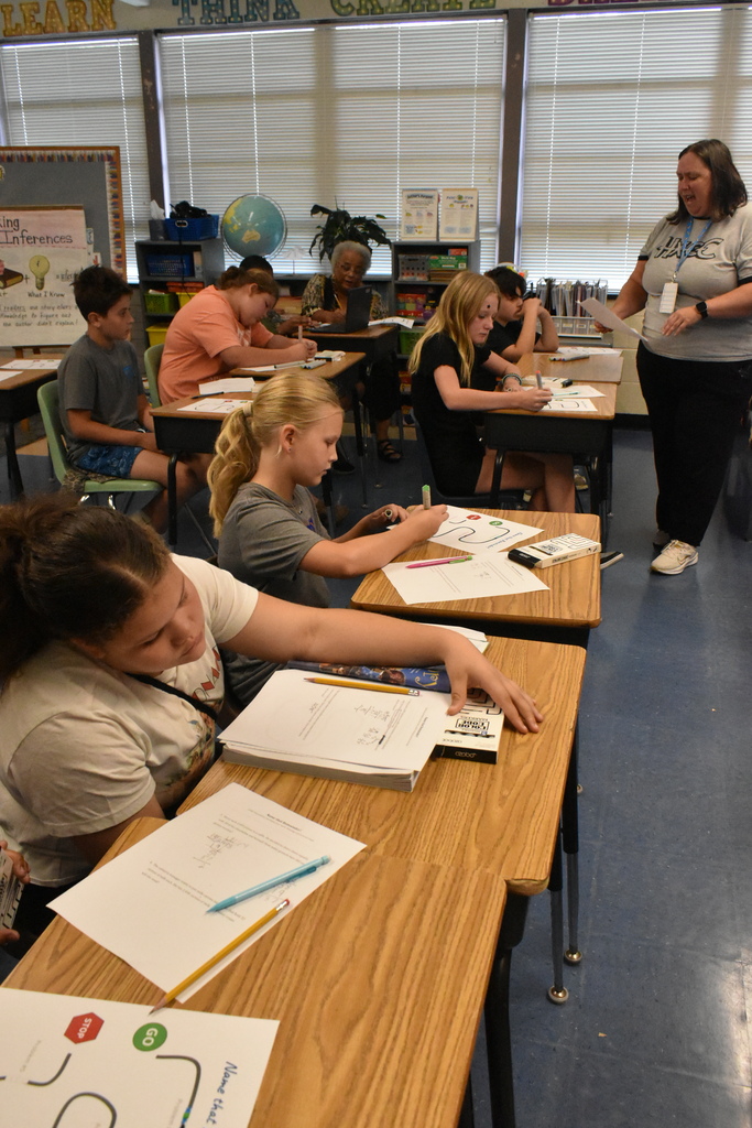 scholars doing division with ozobots