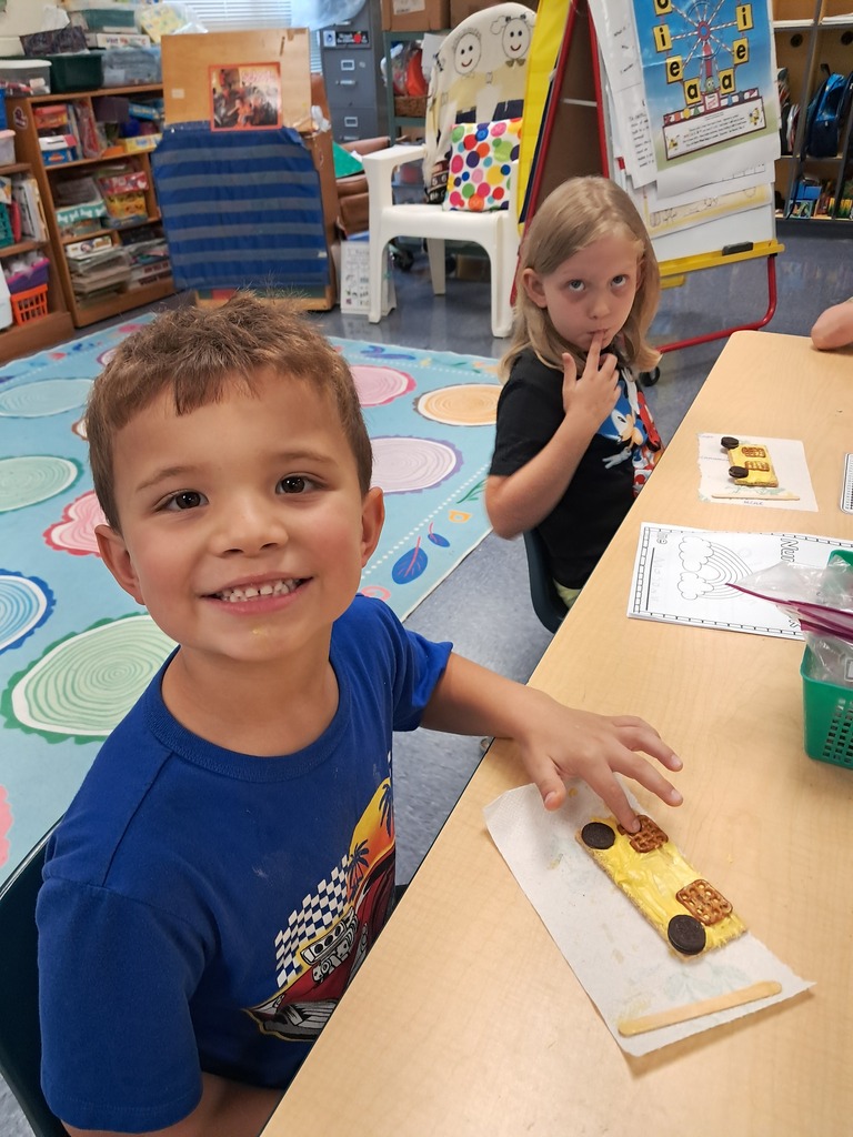 scholars making edible school bus