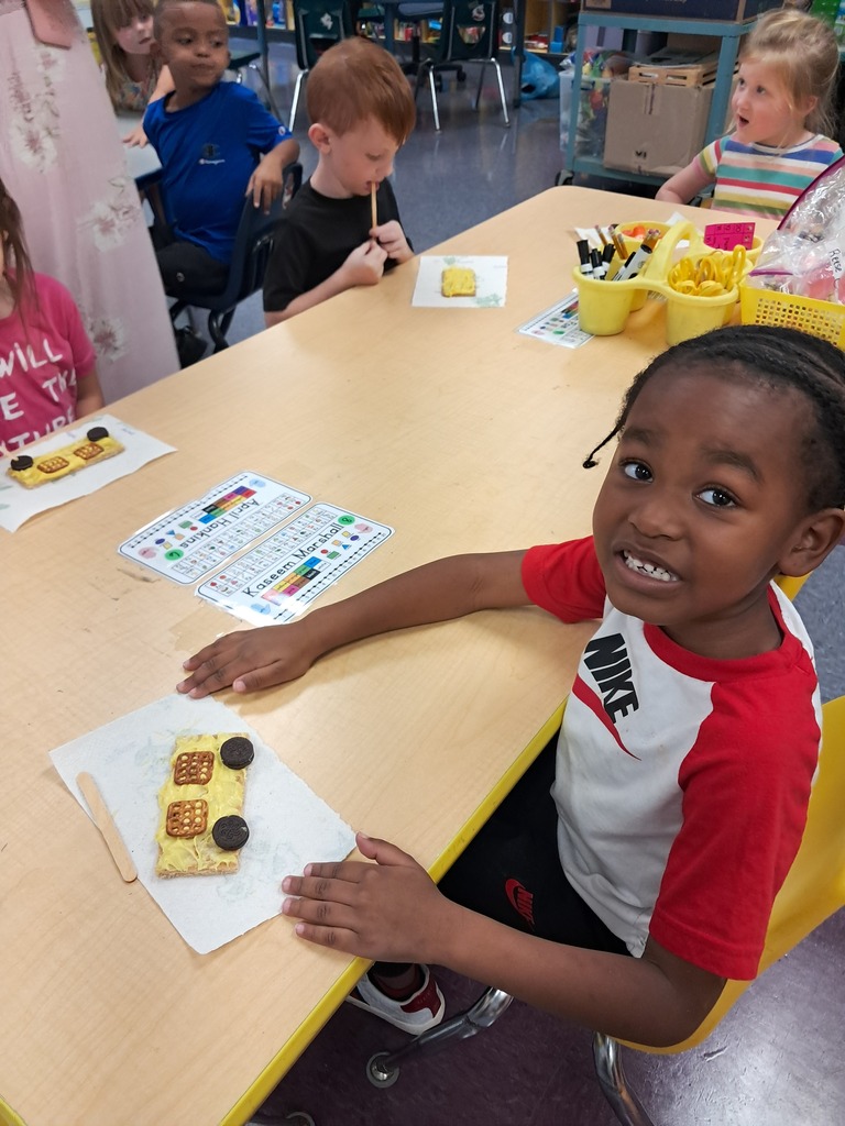 scholars making edible school bus