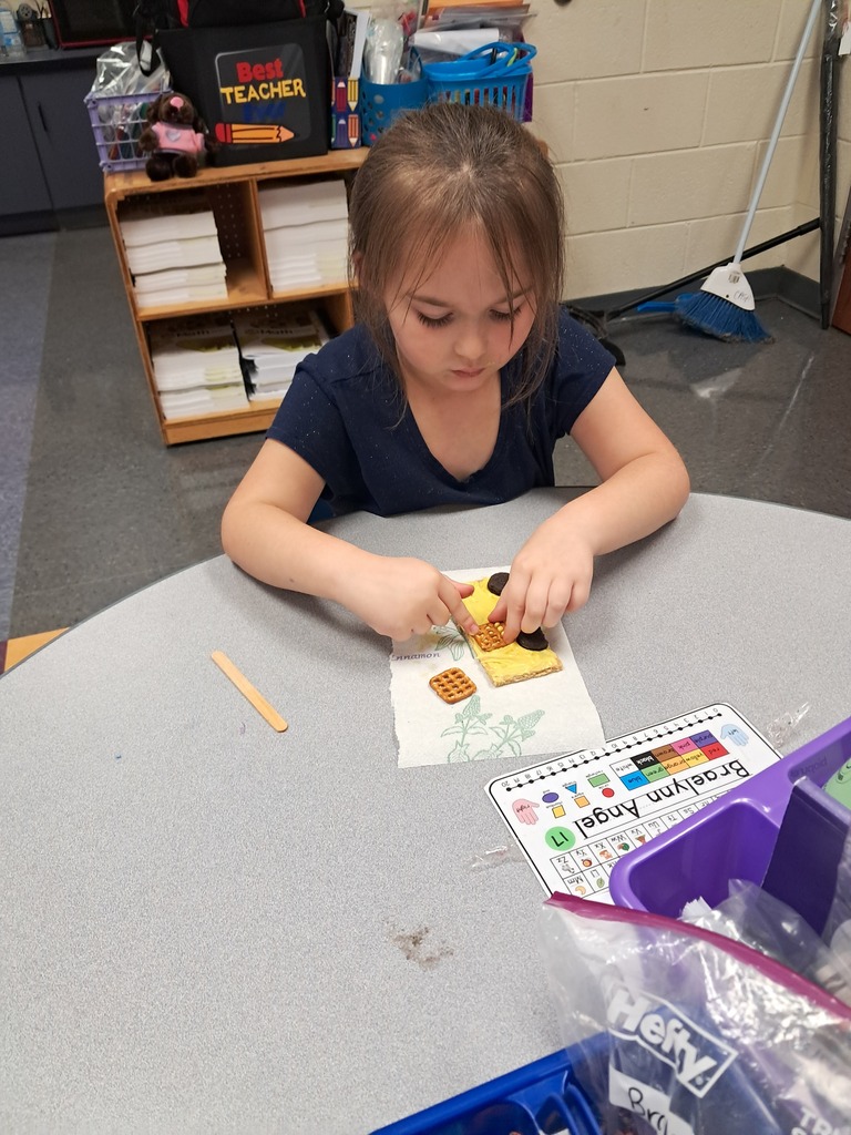 scholars making edible school bus