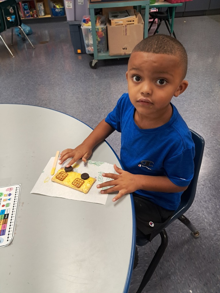 scholars making edible school bus