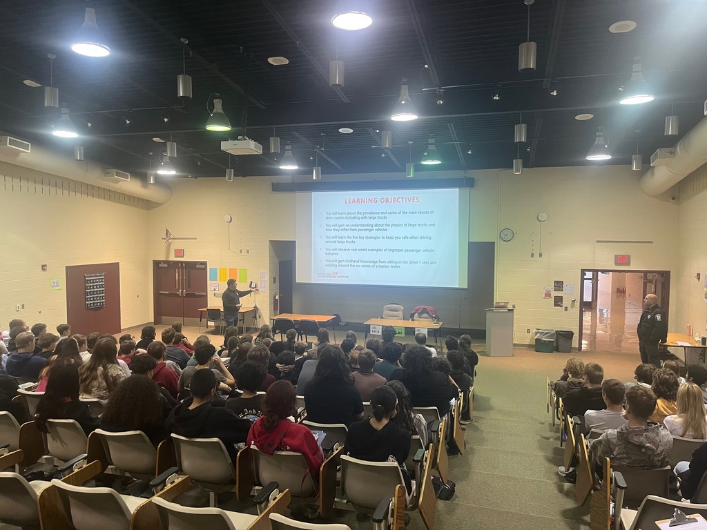 Students listen to safe driving presentation