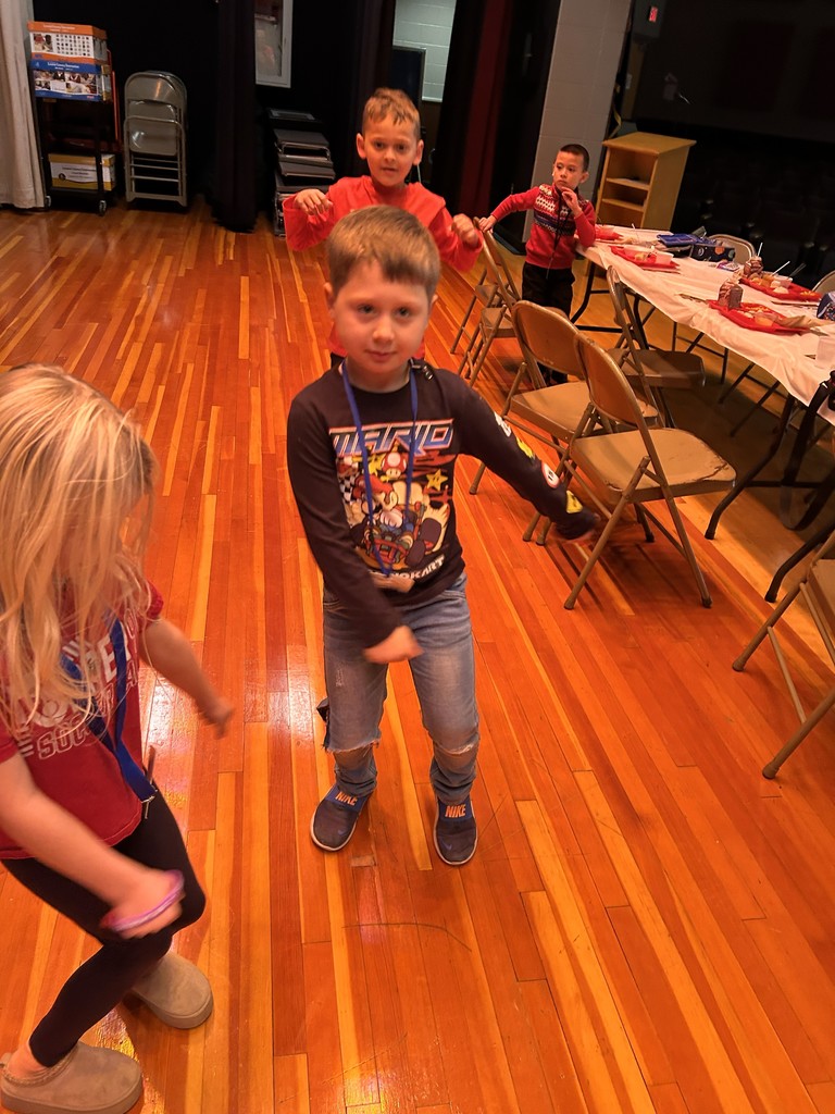 students dancing celebrating