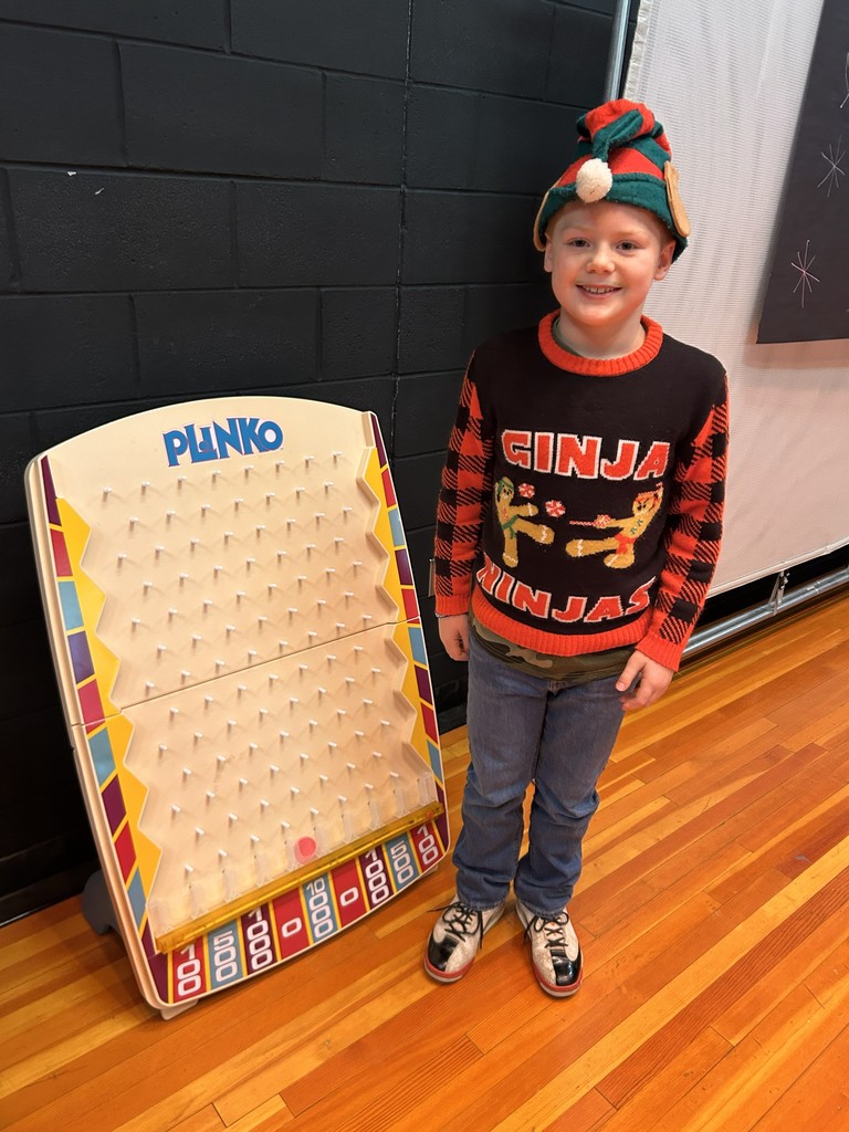 students playing plinko at student of the month lunch