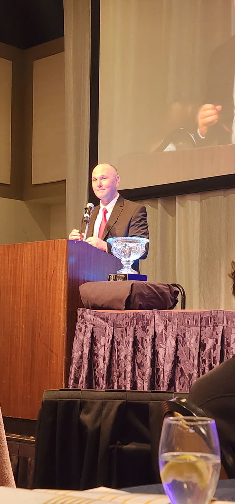 Mr. Manapace during awards banquet for athletic director of the year