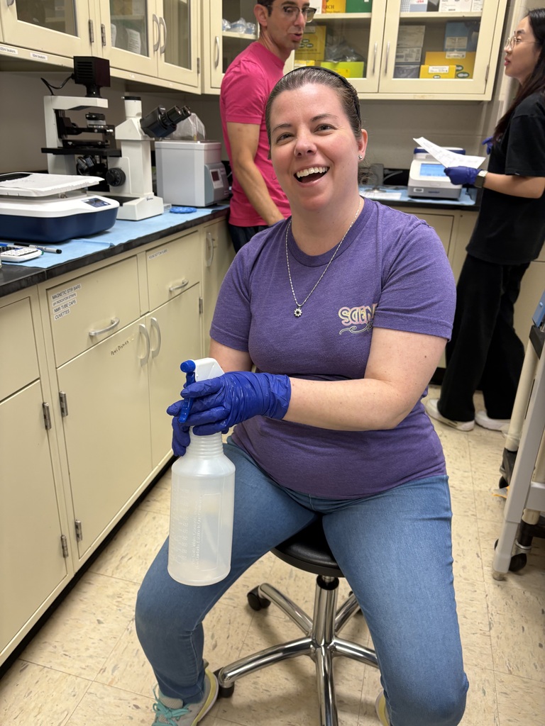 Mrs. Farina working in a lab this summer