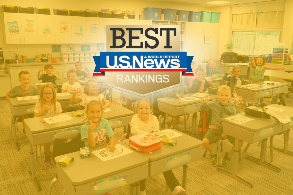U.S. News & World Report logo over a classroom of smiling elementary students.