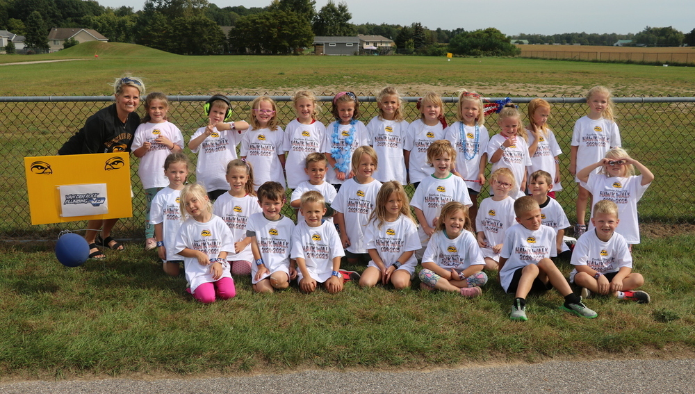 A group of elementary students on a field at Bentheim Elementary.