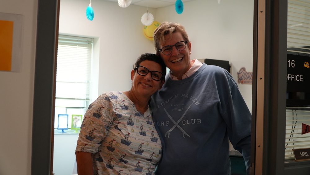 Gina Sneller and Dawn Safford smile.