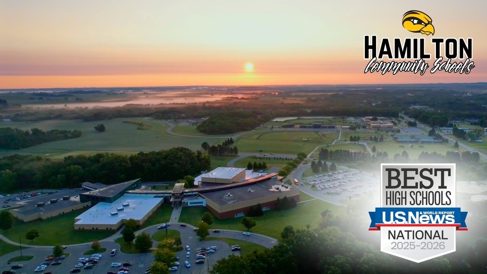 Best High Schools - Hamilton High School image with a sunrise in the morning over Hamilton High School.