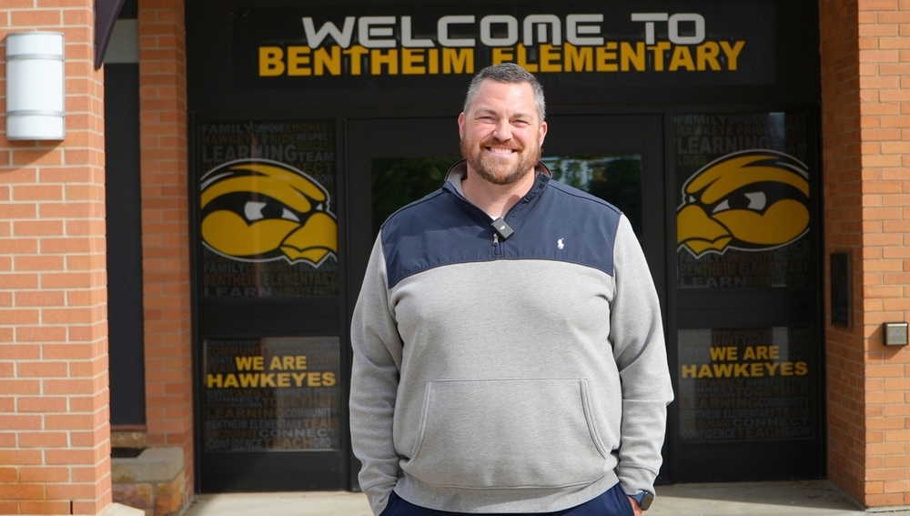 Jared Randall smiles outside of Bentheim Elementary.