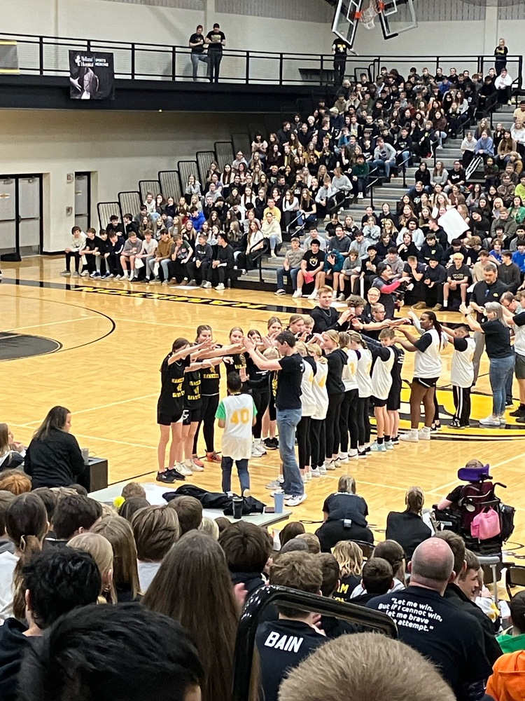 Unified Basketball assembly 2024 - a packed gymnasium.