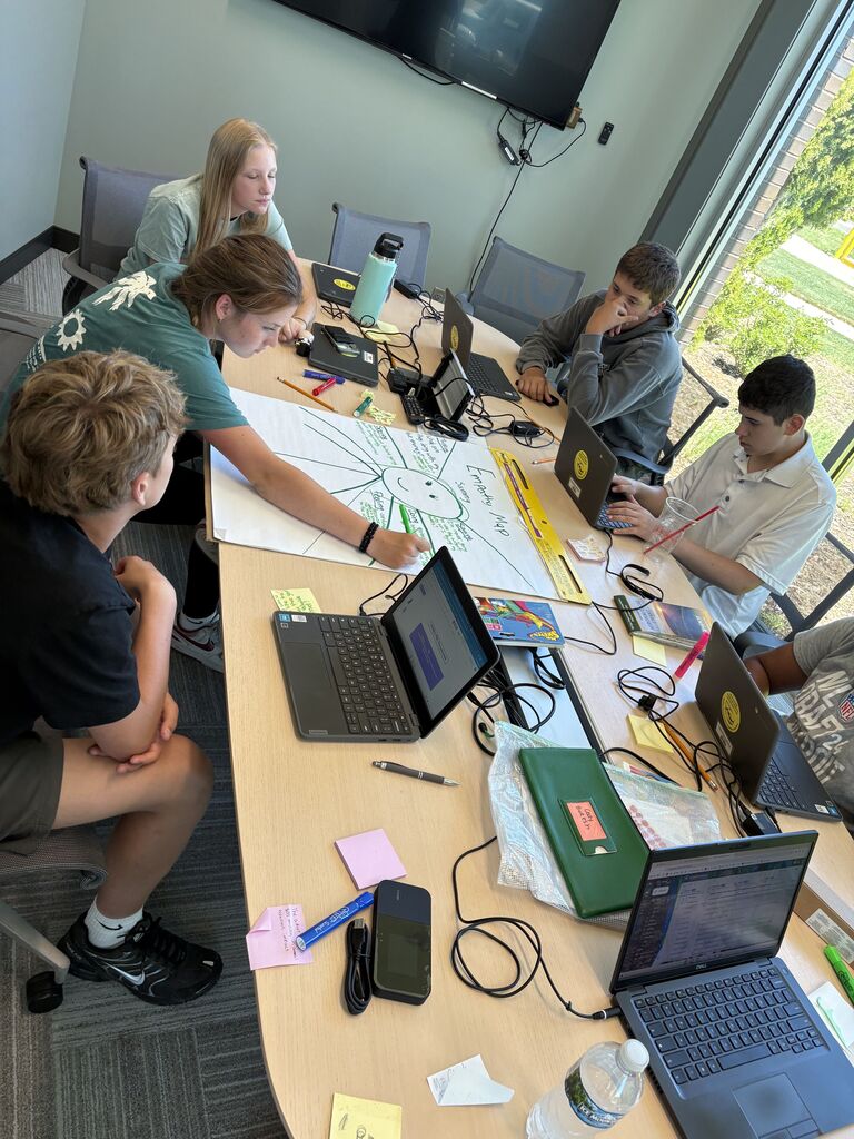 Students work together in a group during summer PBL.