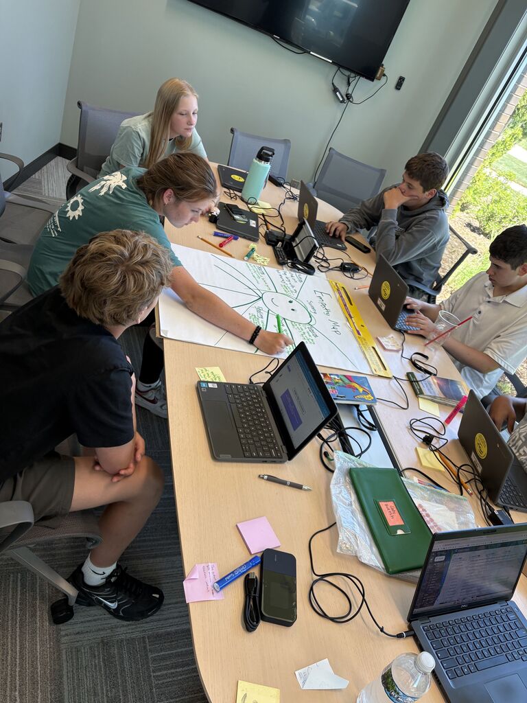 Students work together in a group during summer PBL.