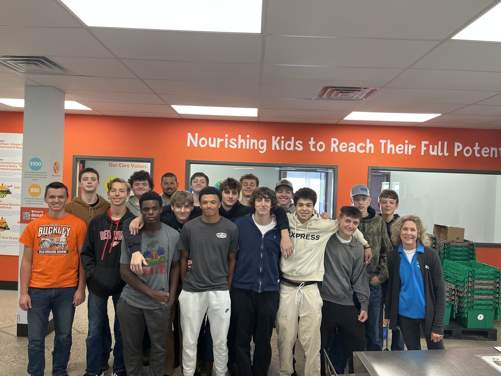 Hamilton High School Ignite program volunteers at Kids Food Basket.