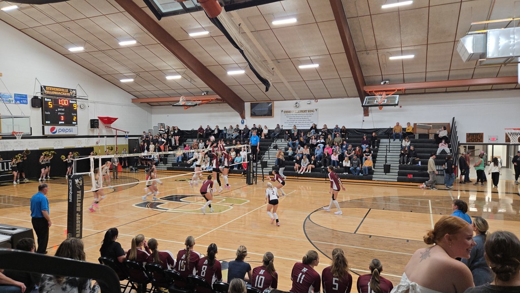 volleyball team playing against Stevensville