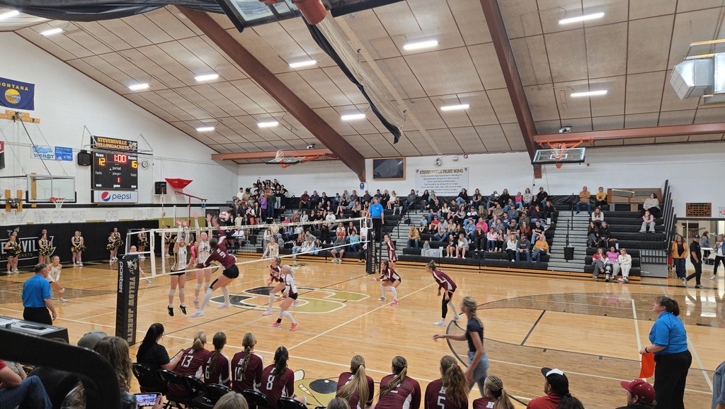 volleyball team playing against Stevensville