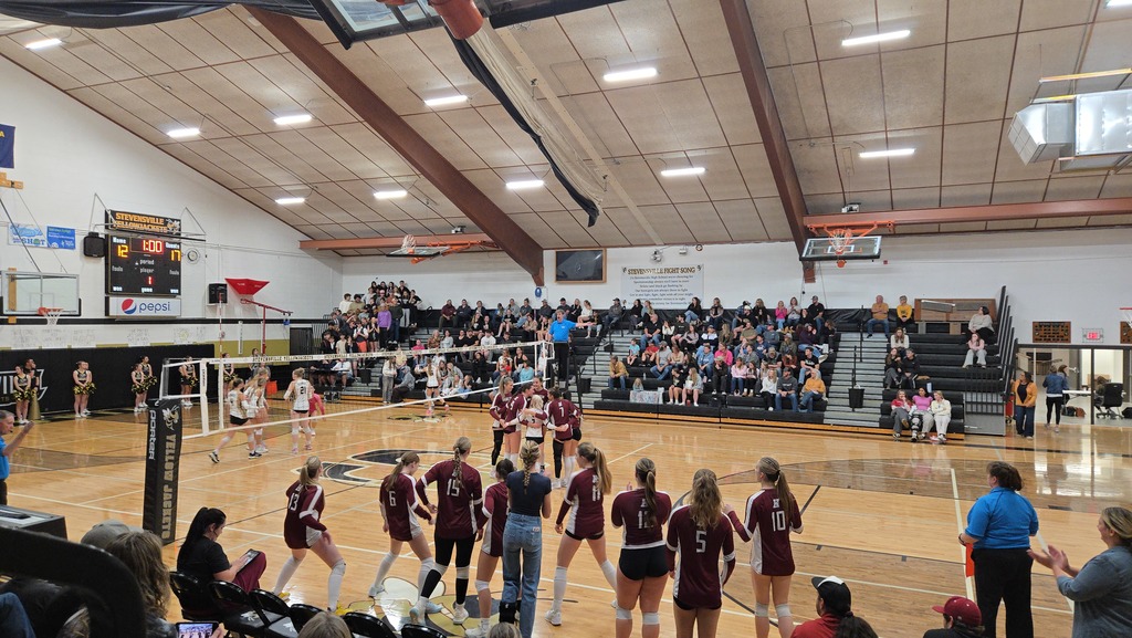 volleyball team playing against Stevensville