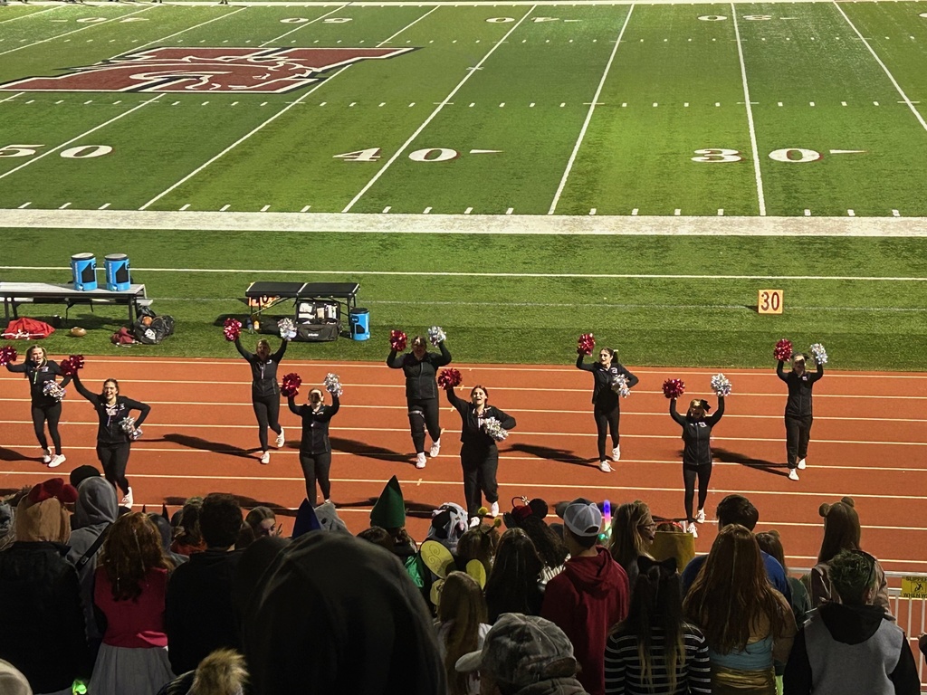 Hamilton high school football field and track with our 9 member cheerleading squad cheering on our football team