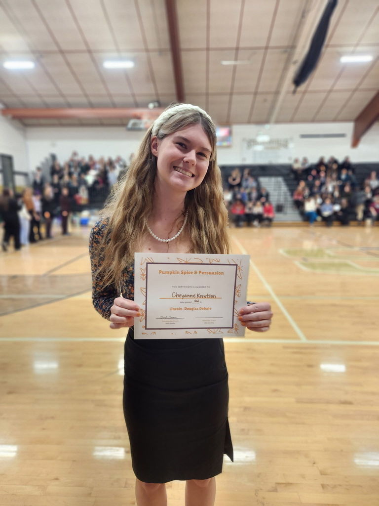 The Hamilton High School Speech & Debate team celebrating their 3rd place overall finish at the tournament in Stevensville on Saturday, November 15, 2025.