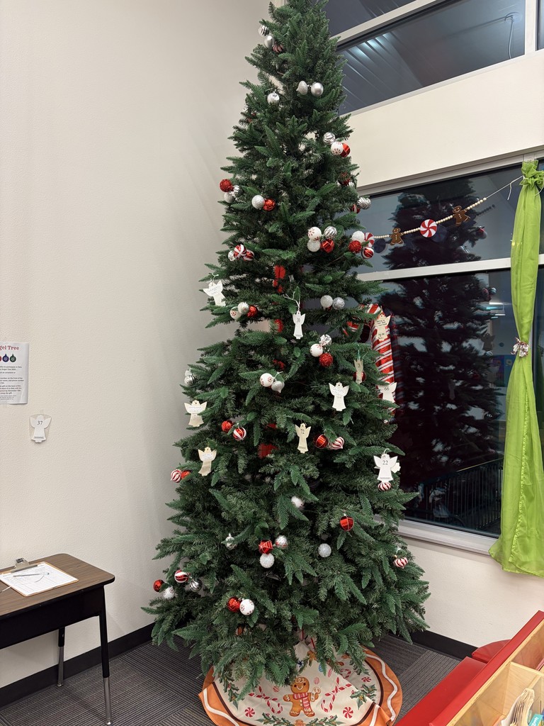 holiday tree with ornaments and angel tree ornaments at Daly Elementary
