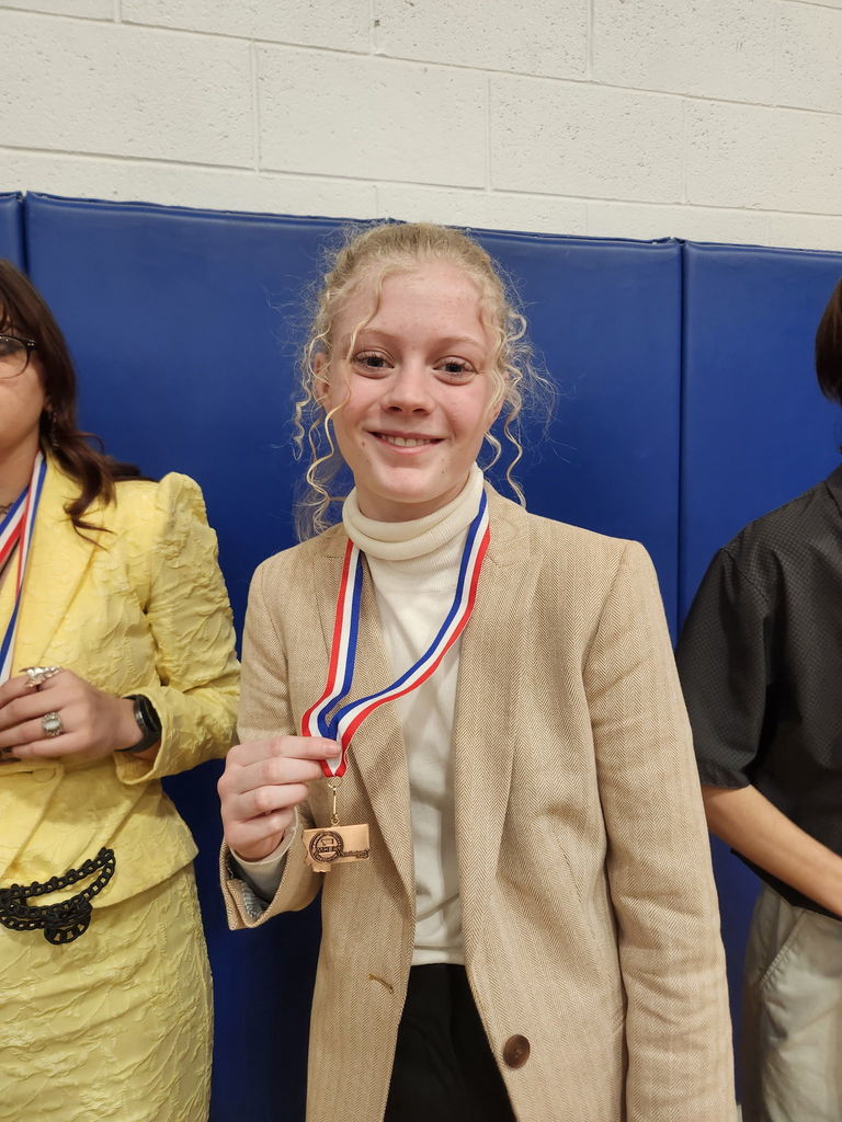 Photos of the Hamilton High School Speech & Debate team after placing 4th at the state level competition in Corvallis