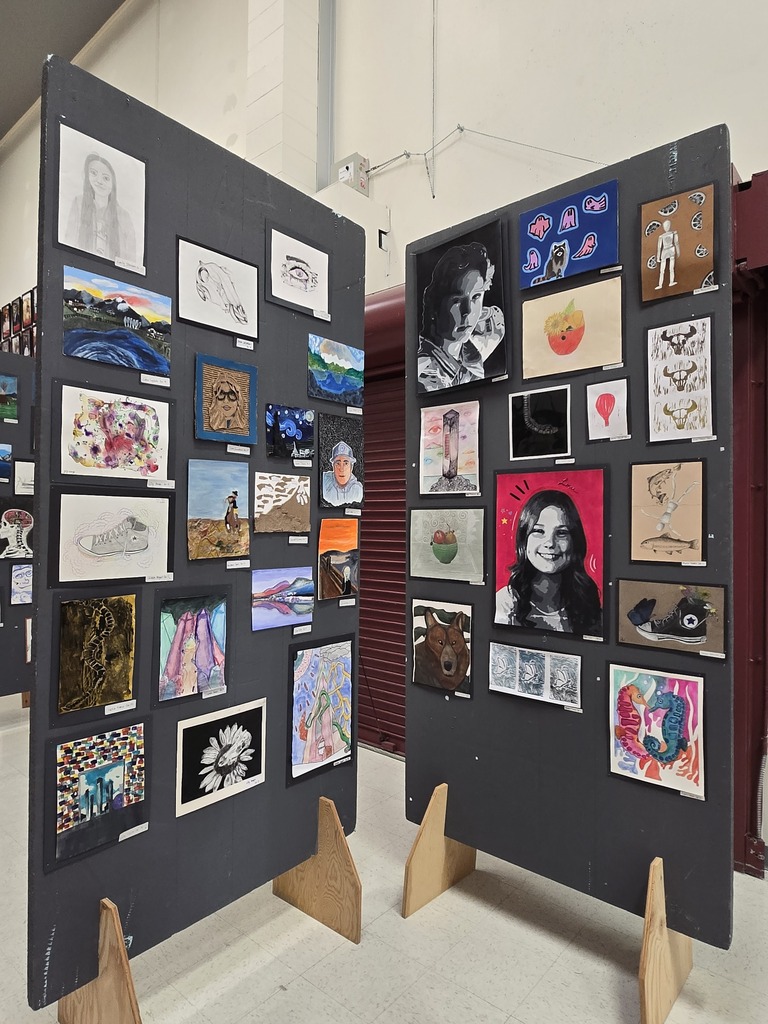 Hamilton High School art students display their works of art at the art show last week