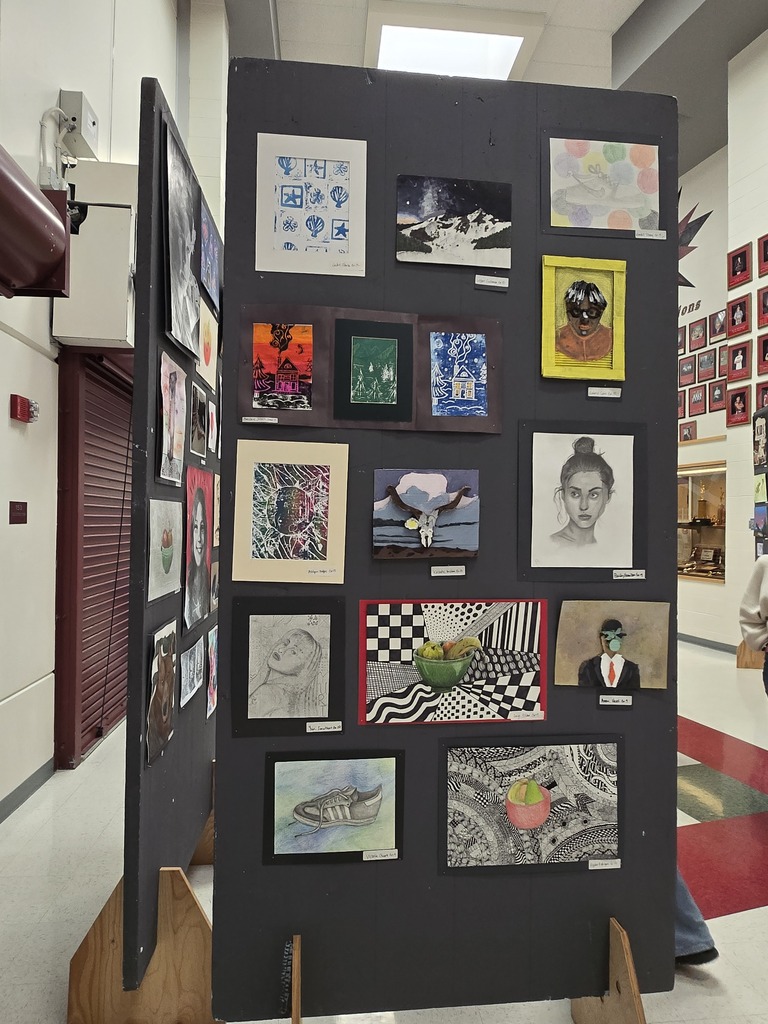 Hamilton High School art students display their works of art at the art show last week