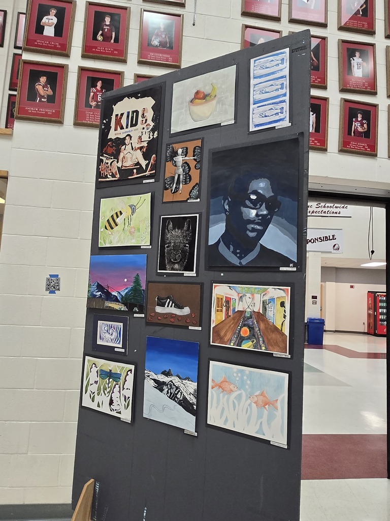 Hamilton High School art students display their works of art at the art show last week