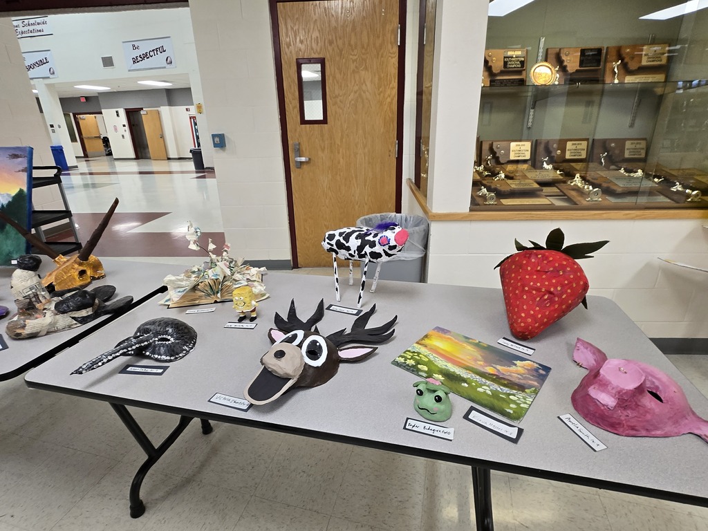 Hamilton High School art students display their works of art at the art show last week