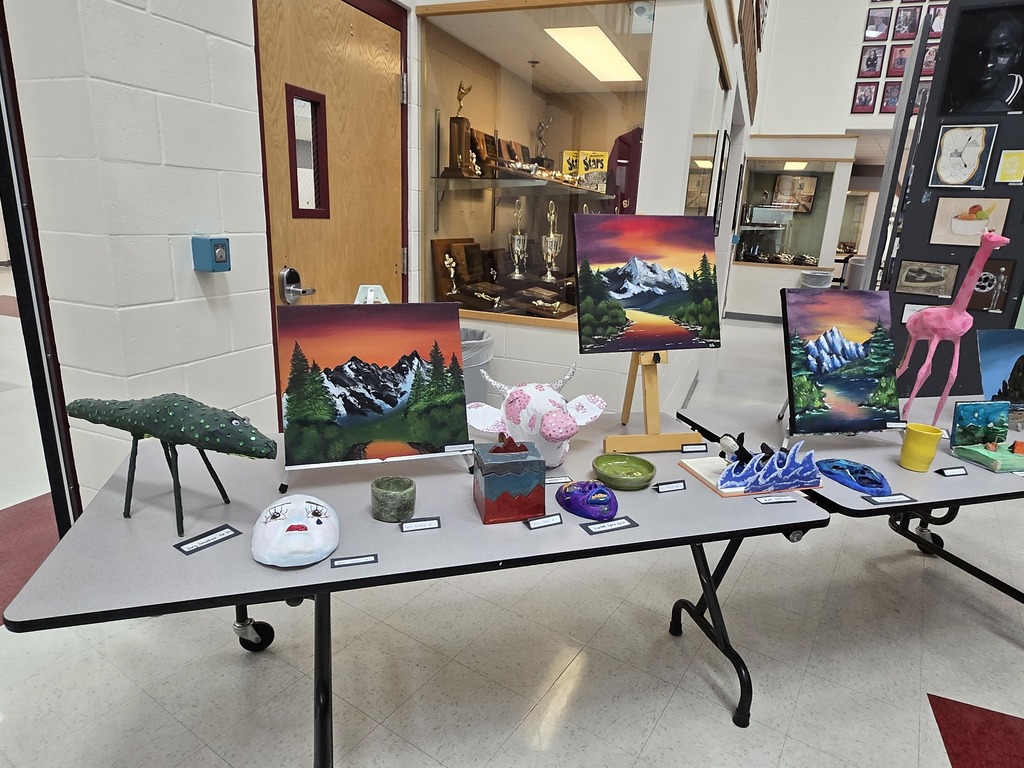 Hamilton High School art students display their works of art at the art show last week