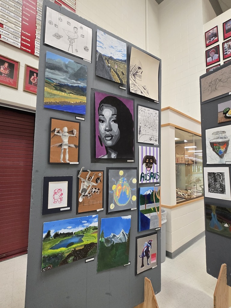 Hamilton High School art students display their works of art at the art show last week