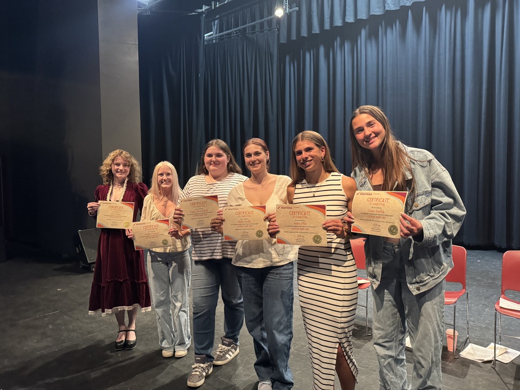 HHS & Bitterroot Polytech students showing their CNA certificates
