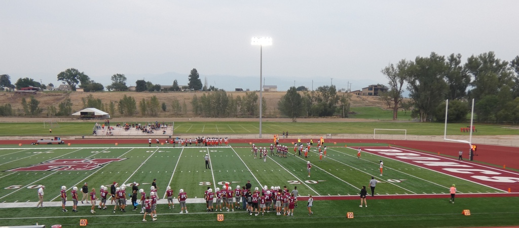 hamilton high school football team playing against ronan at the hamilton athletic complex