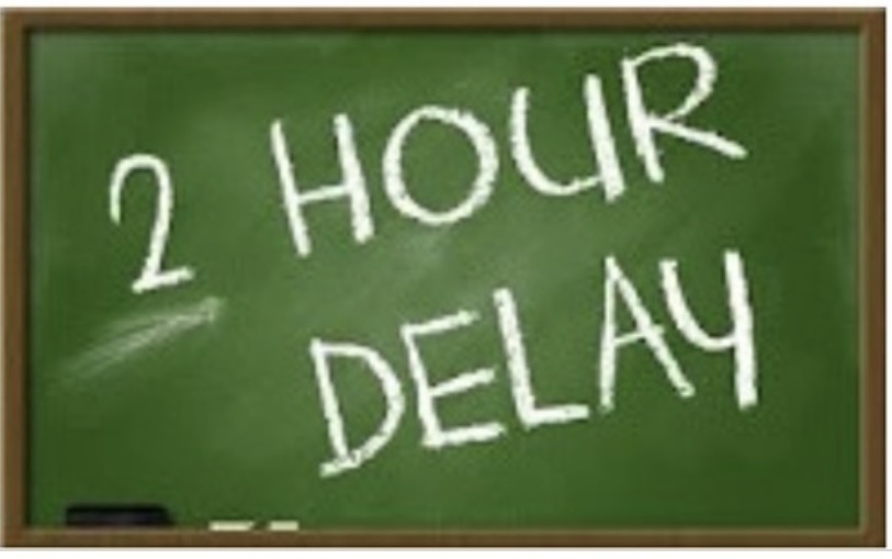 2 Hour Delay on a green chalkboard with chalk and eraser on the tray.