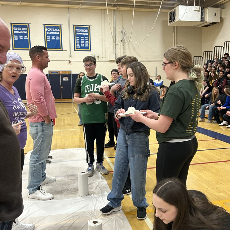 students about to pie our staff