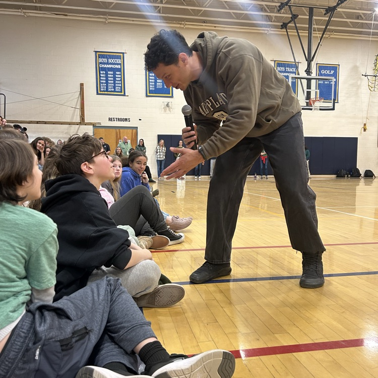 Sam with our students 