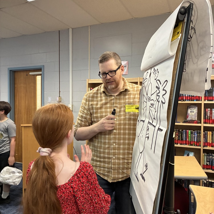 author drawing a picture 