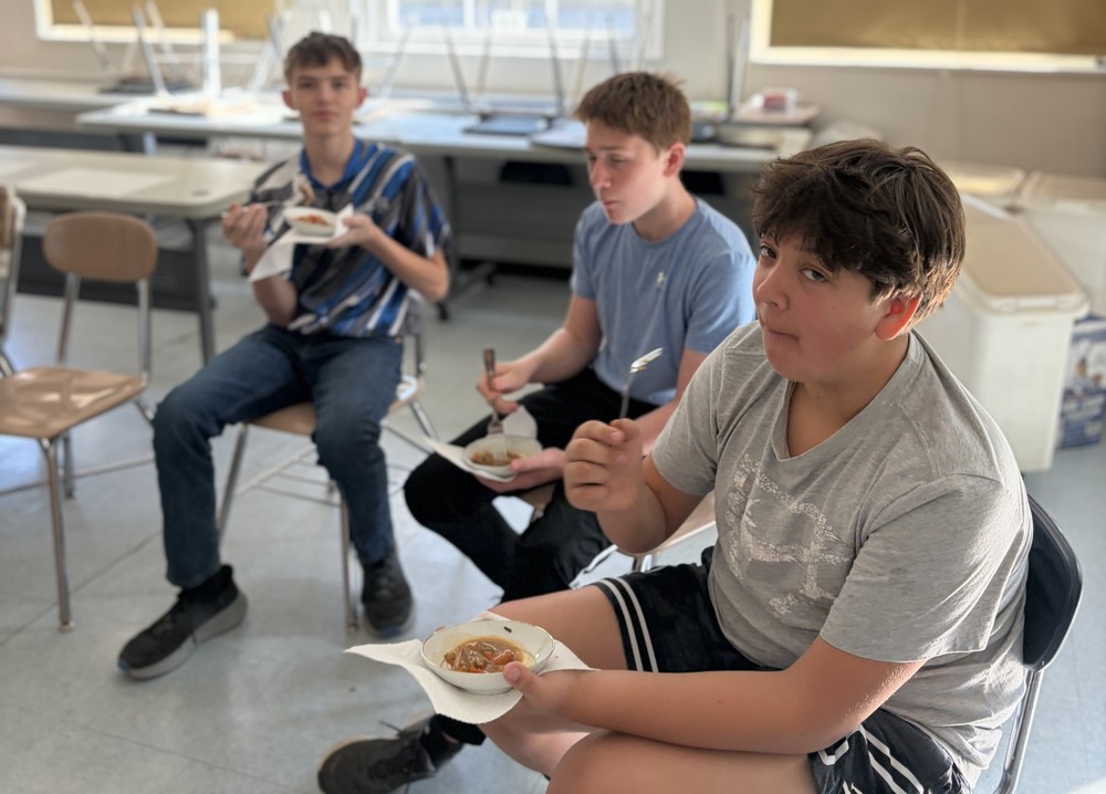 Students tasting beef from Mr. Beavers farm