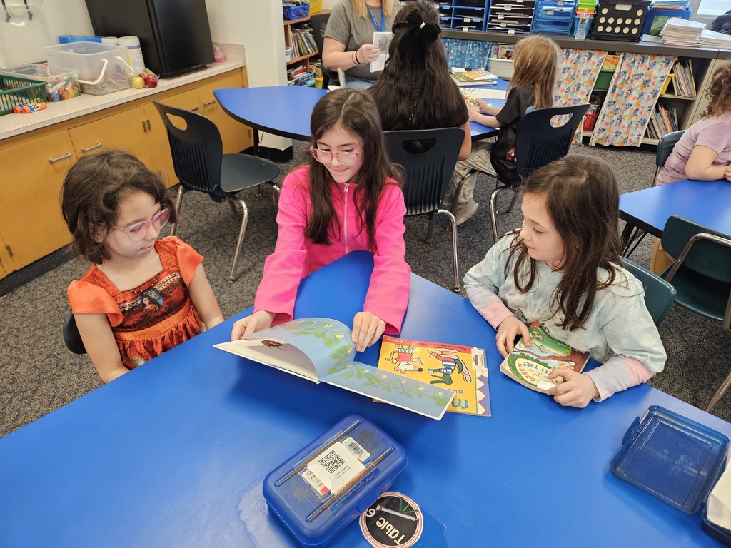 4th and 1st graders read together 2