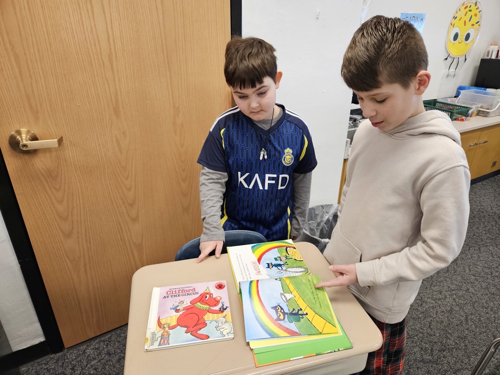 4th and 1st graders read together 3