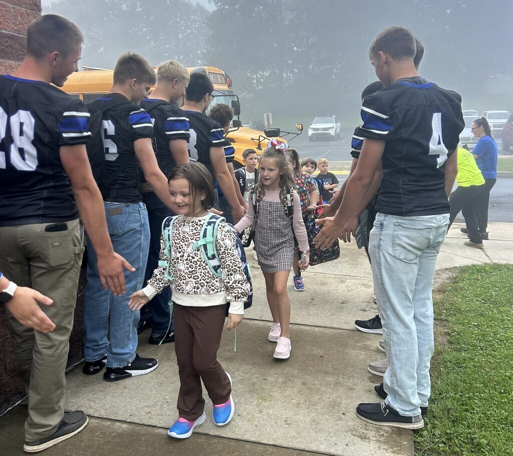 First Day - Football players at elementary - 6