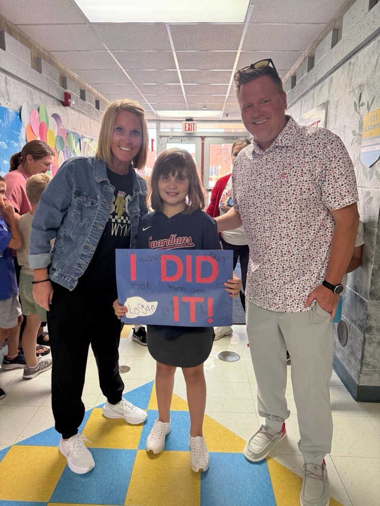teacher and principal with student
