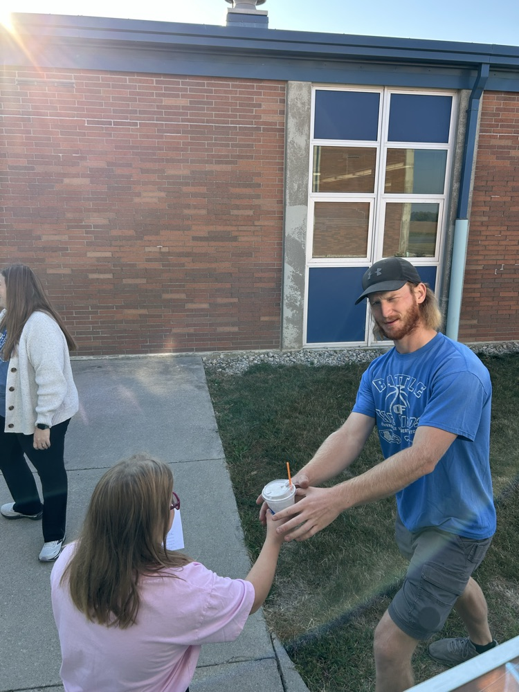 student delivering coffee