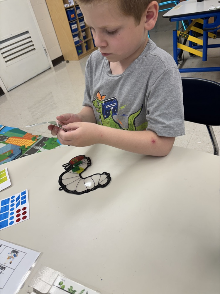 student making sun catcher