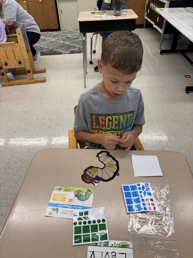 student making sun catcher