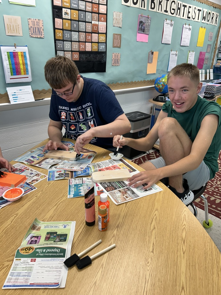 students painting