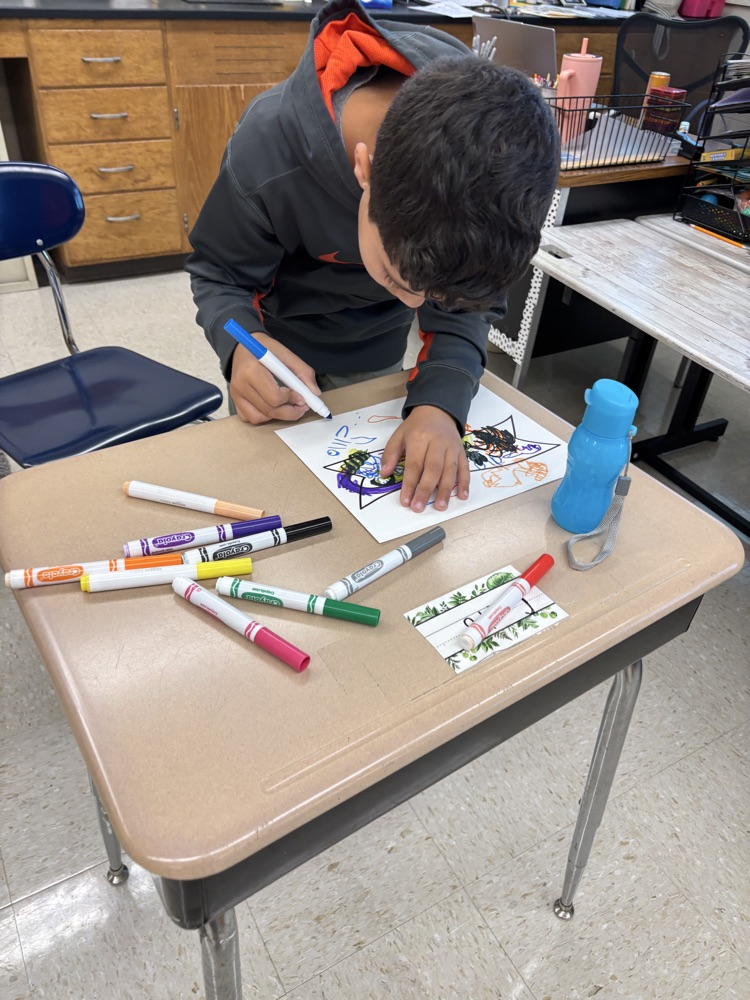 student working on banner